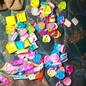 I am selling multi colored, pop it’s in different sizes and shapes